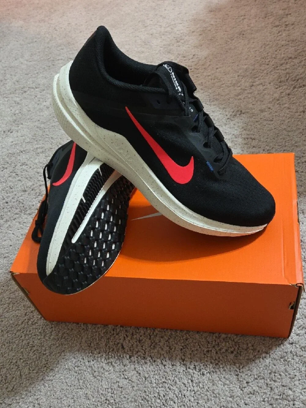 Nike Men’s Black Sneakers with Coral Red Swoosh
